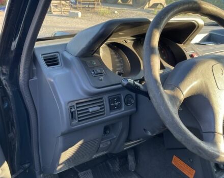 Зеленый Мицубиси Паджеро, объемом двигателя 2.5 л и пробегом 173 тыс. км за 5966 $, фото 3 на Automoto.ua