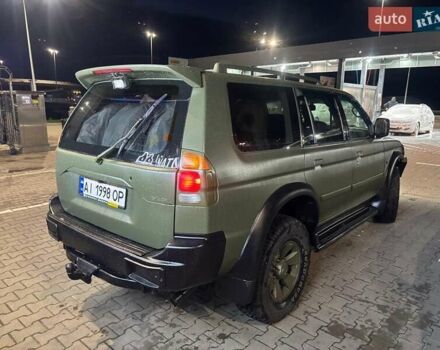 Зеленый Мицубиси Паджеро, объемом двигателя 3 л и пробегом 392 тыс. км за 7700 $, фото 2 на Automoto.ua