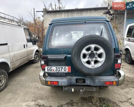Зеленый Мицубиси Паджеро, объемом двигателя 2.5 л и пробегом 180 тыс. км за 6499 $, фото 4 на Automoto.ua