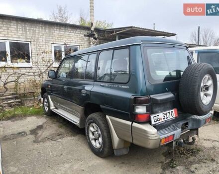 Зеленый Мицубиси Паджеро, объемом двигателя 2.5 л и пробегом 180 тыс. км за 6499 $, фото 6 на Automoto.ua