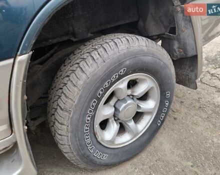 Зеленый Мицубиси Паджеро, объемом двигателя 2.5 л и пробегом 180 тыс. км за 6499 $, фото 12 на Automoto.ua