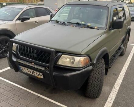 Зеленый Мицубиси Паджеро, объемом двигателя 3 л и пробегом 392 тыс. км за 7700 $, фото 1 на Automoto.ua