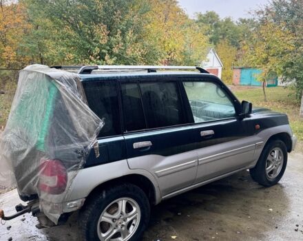 Зеленый Мицубиси Паджеро, объемом двигателя 1.8 л и пробегом 230 тыс. км за 2950 $, фото 3 на Automoto.ua