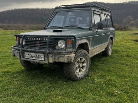 Зеленый Мицубиси Паджеро, объемом двигателя 2.5 л и пробегом 350 тыс. км за 3900 $, фото 1 на Automoto.ua