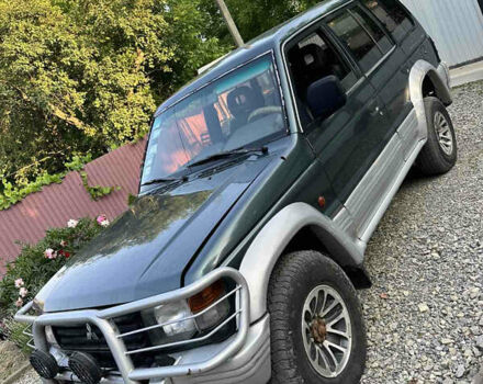 Зеленый Мицубиси Паджеро, объемом двигателя 2.5 л и пробегом 300 тыс. км за 5408 $, фото 1 на Automoto.ua