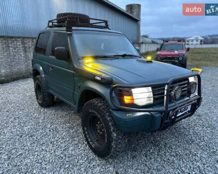 Зеленый Мицубиси Паджеро, объемом двигателя 2.5 л и пробегом 400 тыс. км за 7400 $, фото 1 на Automoto.ua