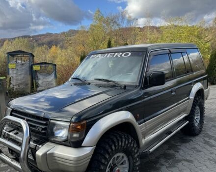 Зеленый Мицубиси Паджеро, объемом двигателя 3.5 л и пробегом 350 тыс. км за 5800 $, фото 1 на Automoto.ua