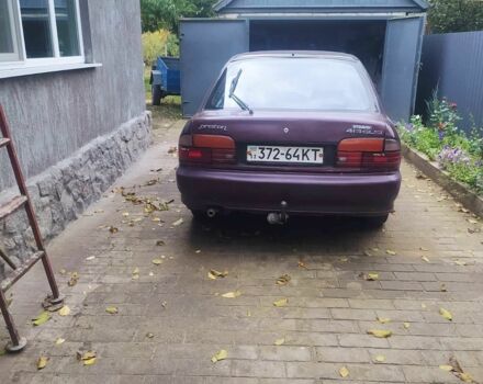 Красный Мицубиси Протон, объемом двигателя 1.3 л и пробегом 290 тыс. км за 1200 $, фото 1 на Automoto.ua