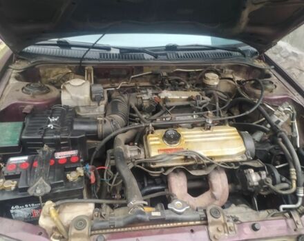 Красный Мицубиси Протон, объемом двигателя 1.3 л и пробегом 290 тыс. км за 1200 $, фото 3 на Automoto.ua