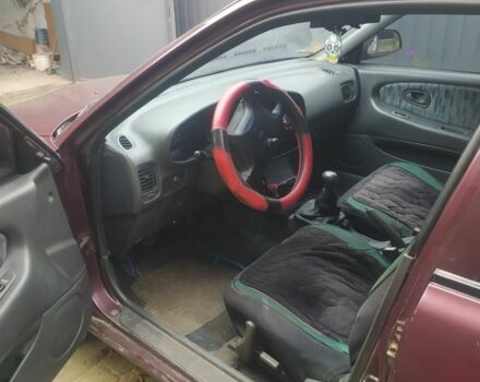 Красный Мицубиси Протон, объемом двигателя 1.3 л и пробегом 290 тыс. км за 1200 $, фото 2 на Automoto.ua