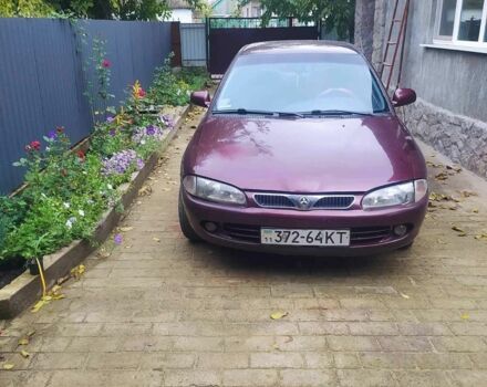 Красный Мицубиси Протон, объемом двигателя 1.3 л и пробегом 290 тыс. км за 1200 $, фото 4 на Automoto.ua