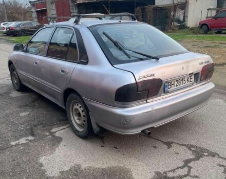 Серый Мицубиси Протон, объемом двигателя 1.5 л и пробегом 154 тыс. км за 1150 $, фото 3 на Automoto.ua