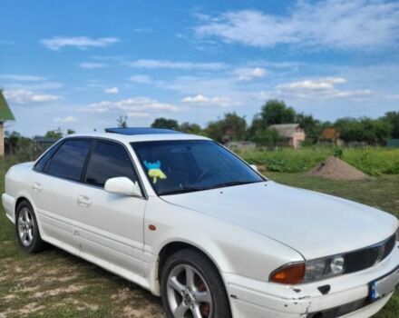 Белый Мицубиси Сигма, объемом двигателя 3 л и пробегом 330 тыс. км за 3000 $, фото 1 на Automoto.ua