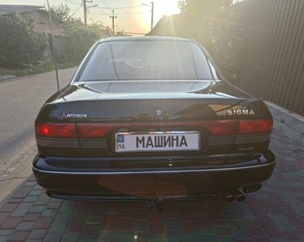 Черный Мицубиси Сигма, объемом двигателя 3 л и пробегом 250 тыс. км за 3452 $, фото 2 на Automoto.ua
