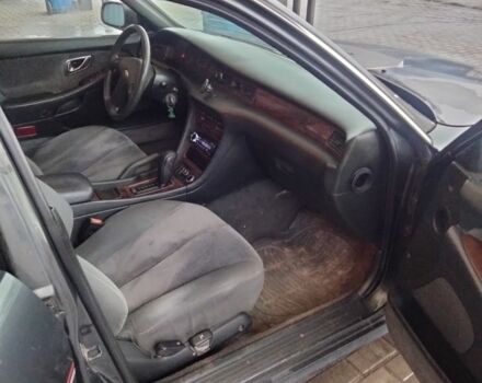 Черный Мицубиси Сигма, объемом двигателя 3 л и пробегом 300 тыс. км за 3000 $, фото 3 на Automoto.ua