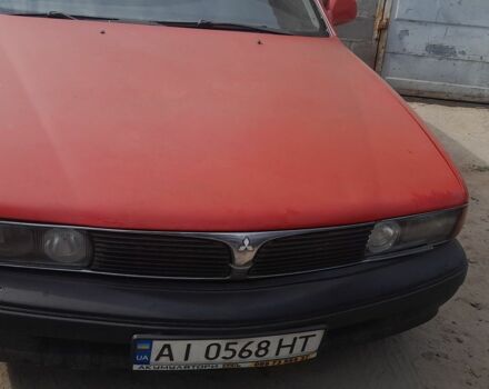 Красный Мицубиси Сигма, объемом двигателя 3 л и пробегом 200 тыс. км за 849 $, фото 2 на Automoto.ua