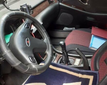 Красный Мицубиси Сигма, объемом двигателя 3 л и пробегом 100 тыс. км за 2000 $, фото 7 на Automoto.ua