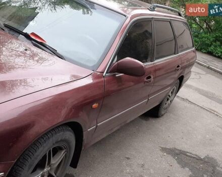 Красный Мицубиси Сигма, объемом двигателя 3 л и пробегом 100 тыс. км за 2000 $, фото 5 на Automoto.ua