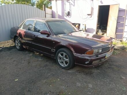 Красный Мицубиси Сигма, объемом двигателя 3 л и пробегом 350 тыс. км за 1500 $, фото 1 на Automoto.ua