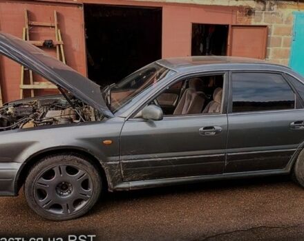 Серый Мицубиси Сигма, объемом двигателя 3 л и пробегом 370 тыс. км за 1546 $, фото 3 на Automoto.ua