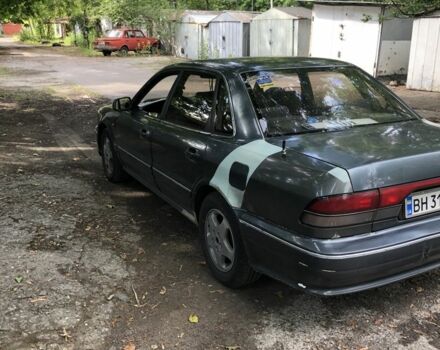 Серый Мицубиси Сигма, объемом двигателя 3 л и пробегом 300 тыс. км за 1500 $, фото 3 на Automoto.ua