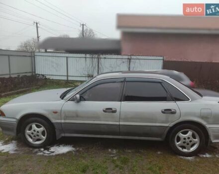 Серый Мицубиси Сигма, объемом двигателя 3 л и пробегом 366 тыс. км за 1700 $, фото 6 на Automoto.ua