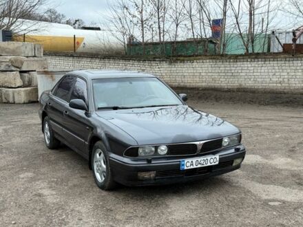 Серый Мицубиси Сигма, объемом двигателя 3 л и пробегом 185 тыс. км за 1550 $, фото 1 на Automoto.ua