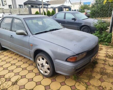 Мицубиси Сигма 2000 в Черноморске (Ильичевске) на Automoto.ua Серый Мицубиси Сигма, объемом двигателя 3 л и пробегом 250 тыс. км за 699 $, фото 1 на Automoto.ua