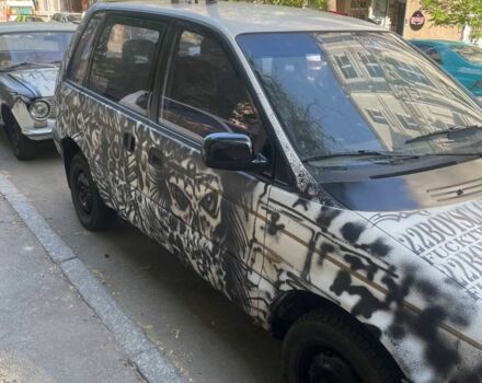 Белый Мицубиси Спейс Раннер, объемом двигателя 1.8 л и пробегом 377 тыс. км за 2000 $, фото 1 на Automoto.ua