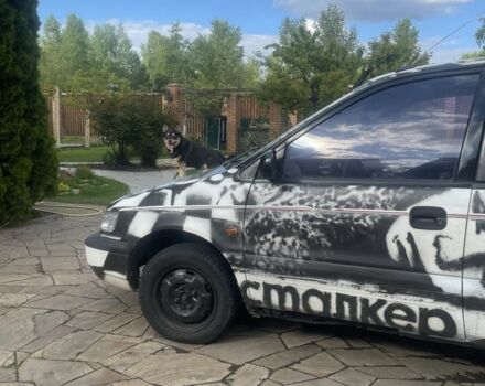 Белый Мицубиси Спейс Раннер, объемом двигателя 1.8 л и пробегом 377 тыс. км за 2000 $, фото 2 на Automoto.ua