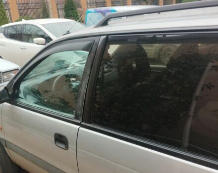 Серый Мицубиси Спейс Раннер, объемом двигателя 2 л и пробегом 56 тыс. км за 1424 $, фото 1 на Automoto.ua