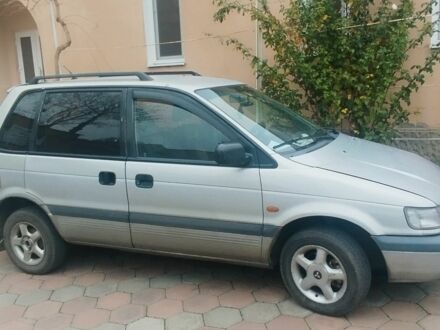 Серый Мицубиси Спейс Раннер, объемом двигателя 2 л и пробегом 56 тыс. км за 1424 $, фото 1 на Automoto.ua