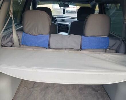 Синій Міцубісі Спейс Раннер, об'ємом двигуна 1.8 л та пробігом 390 тис. км за 2700 $, фото 11 на Automoto.ua