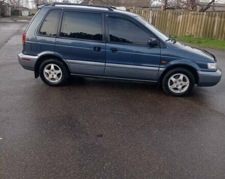 Синій Міцубісі Спейс Раннер, об'ємом двигуна 1.8 л та пробігом 390 тис. км за 2700 $, фото 2 на Automoto.ua