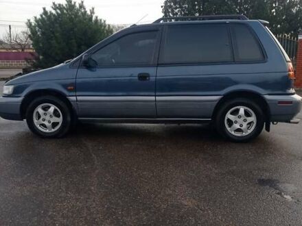 Синий Мицубиси Спейс Раннер, объемом двигателя 1.8 л и пробегом 390 тыс. км за 2700 $, фото 1 на Automoto.ua