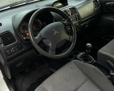 Білий Міцубісі Спейс Стар, об'ємом двигуна 1.58 л та пробігом 319 тис. км за 3500 $, фото 11 на Automoto.ua