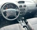 Білий Міцубісі Спейс Стар, об'ємом двигуна 1.6 л та пробігом 190 тис. км за 1700 $, фото 3 на Automoto.ua