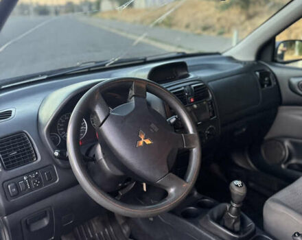 Белый Мицубиси Спейс Стар, объемом двигателя 1.6 л и пробегом 319 тыс. км за 2950 $, фото 29 на Automoto.ua
