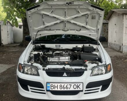 Білий Міцубісі Спейс Стар, об'ємом двигуна 1.6 л та пробігом 228 тис. км за 2850 $, фото 16 на Automoto.ua