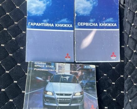 Білий Міцубісі Спейс Стар, об'ємом двигуна 1.6 л та пробігом 228 тис. км за 2850 $, фото 18 на Automoto.ua