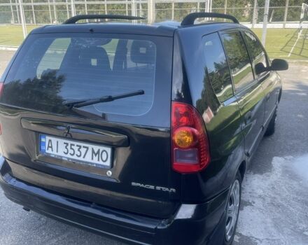 Чорний Міцубісі Спейс Стар, об'ємом двигуна 1.6 л та пробігом 370 тис. км за 3700 $, фото 5 на Automoto.ua