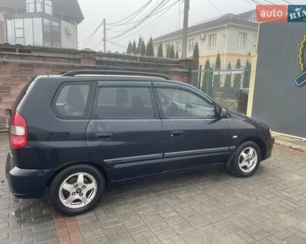 Черный Мицубиси Спейс Стар, объемом двигателя 1.3 л и пробегом 300 тыс. км за 2500 $, фото 2 на Automoto.ua
