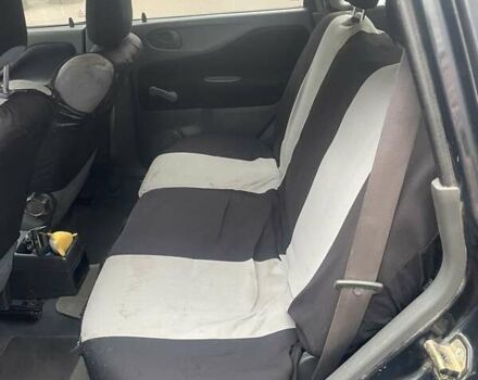 Черный Мицубиси Спейс Стар, объемом двигателя 1.3 л и пробегом 300 тыс. км за 2500 $, фото 5 на Automoto.ua