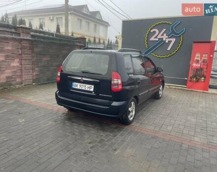 Черный Мицубиси Спейс Стар, объемом двигателя 1.3 л и пробегом 300 тыс. км за 2500 $, фото 3 на Automoto.ua