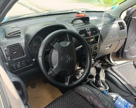 Чорний Міцубісі Спейс Стар, об'ємом двигуна 1.6 л та пробігом 210 тис. км за 2000 $, фото 1 на Automoto.ua