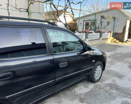 Чорний Міцубісі Спейс Стар, об'ємом двигуна 1.6 л та пробігом 300 тис. км за 2750 $, фото 12 на Automoto.ua