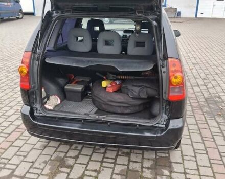 Черный Мицубиси Спейс Стар, объемом двигателя 1.58 л и пробегом 478 тыс. км за 2600 $, фото 4 на Automoto.ua