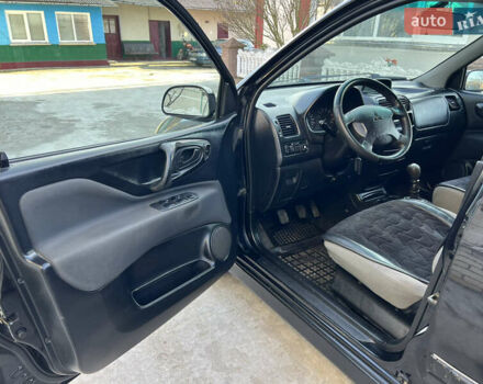 Чорний Міцубісі Спейс Стар, об'ємом двигуна 1.6 л та пробігом 300 тис. км за 2750 $, фото 25 на Automoto.ua