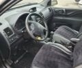 Черный Мицубиси Спейс Стар, объемом двигателя 1.58 л и пробегом 478 тыс. км за 2600 $, фото 1 на Automoto.ua