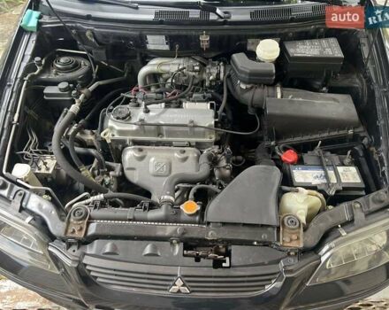 Чорний Міцубісі Спейс Стар, об'ємом двигуна 1.6 л та пробігом 153 тис. км за 4800 $, фото 3 на Automoto.ua